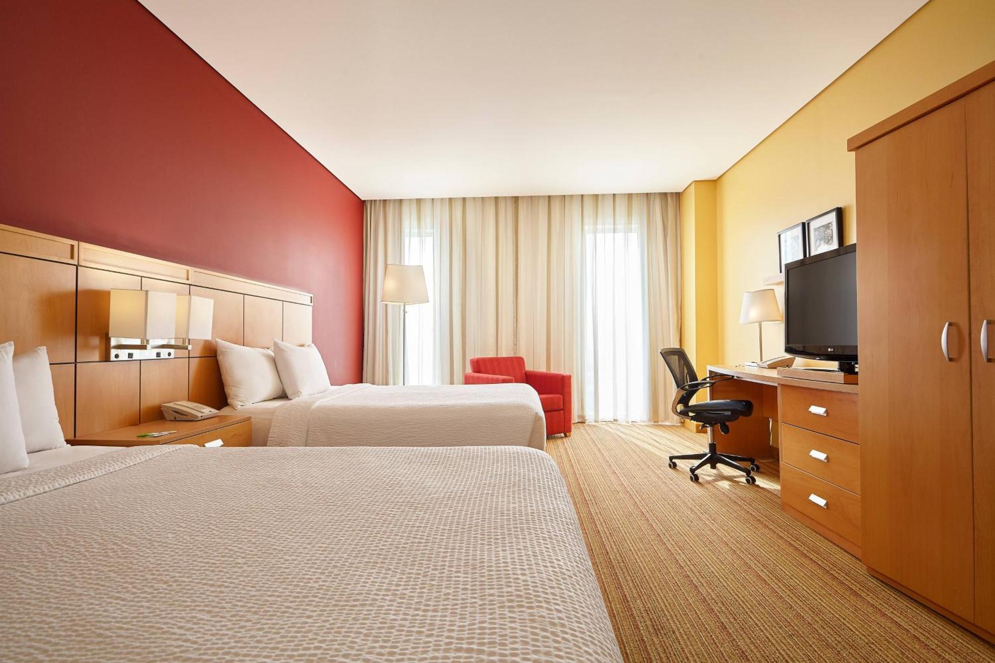 Courtyard By Marriott Leon At The Poliforum Eksteriør bilde